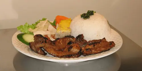 This simple Vietnamese rice dish with grilled meat and vegetables is a safe bet for those who eat a gluten-free diet. 