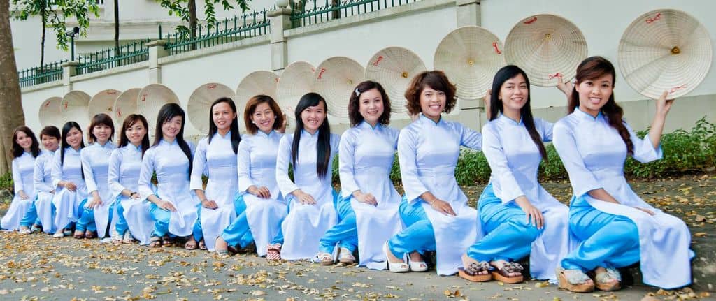Our XO Tours ladies wearing their traditional Ao Dai and Non La (Vietnamese conical hat).. 