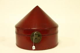 A beautiful leather hand crafted box to store your palm leaf hat! 