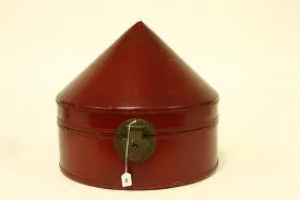 A beautiful leather hand crafted box to store your palm leaf hat! 