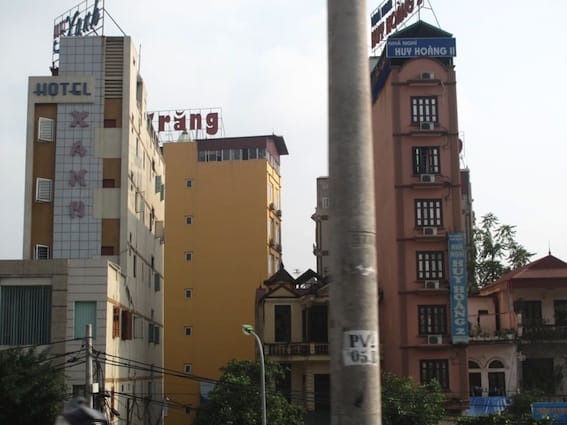 Many of the tall narrow houses in Vietnam have been converted into hostels or budget hotels. 