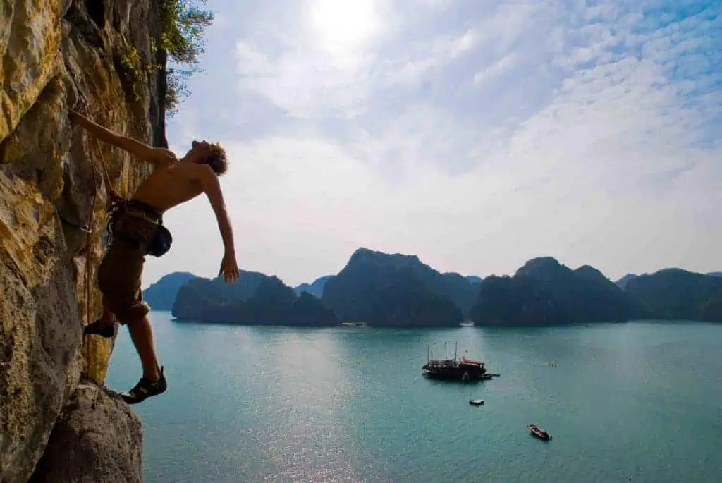 climbing with a beautiful landscape blue sea in Cat Ba Island, Vietnam