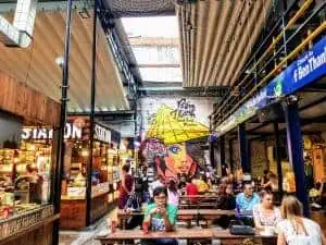 The interior of the street food market at Ben Thanh Market.