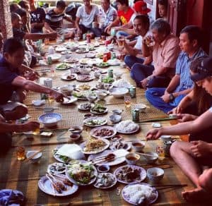 A Vietnamese family eating together.