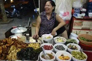 Friendly street food vendor