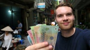 A traveler fanning his money